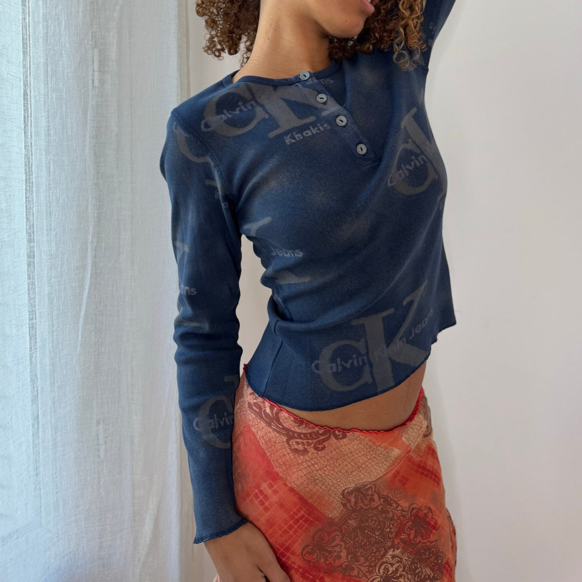 Vintage Calvin Klein Faded Navy Blue Monogram Logo Print Long Sleeve Henley Top