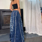 Vintage 00s low rise flared denim maxi skirt with exposed seams (L-XL)