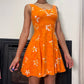 Sourced in Italy - Vintage 90s euro orange floral print mini dress (XS) summer