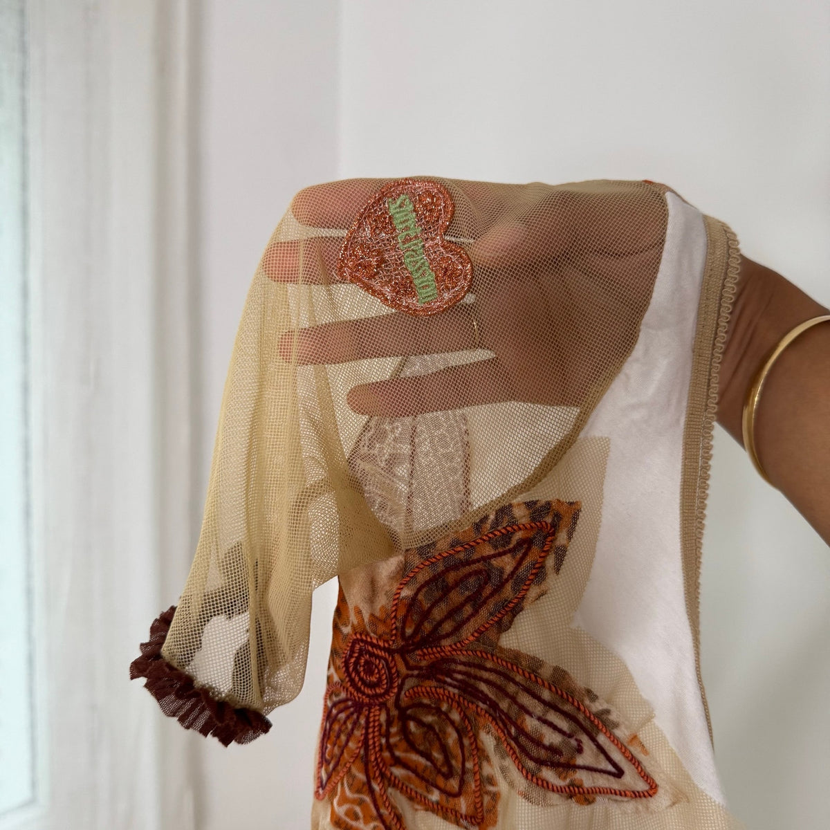 Shirt Passion Italian vintage Y2K cream & brown asymmetrical mesh top with embroidered floral appliqués, leopard print back & one shoulder detail