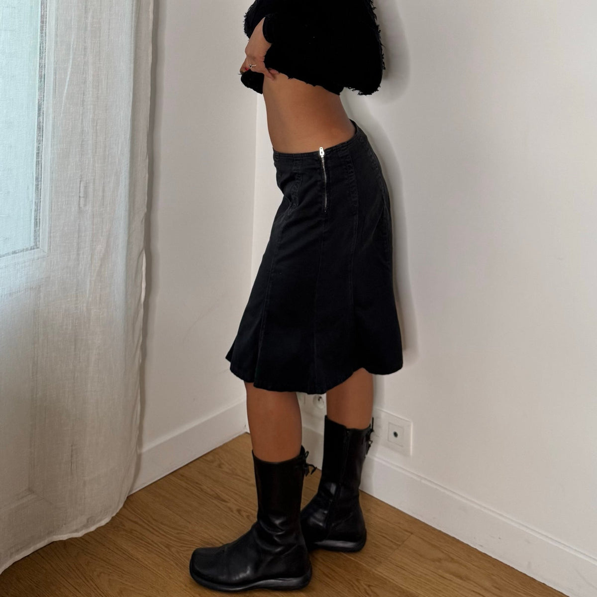 French vintage 2000s black denim knee-length skirt with flared panels & back zipper