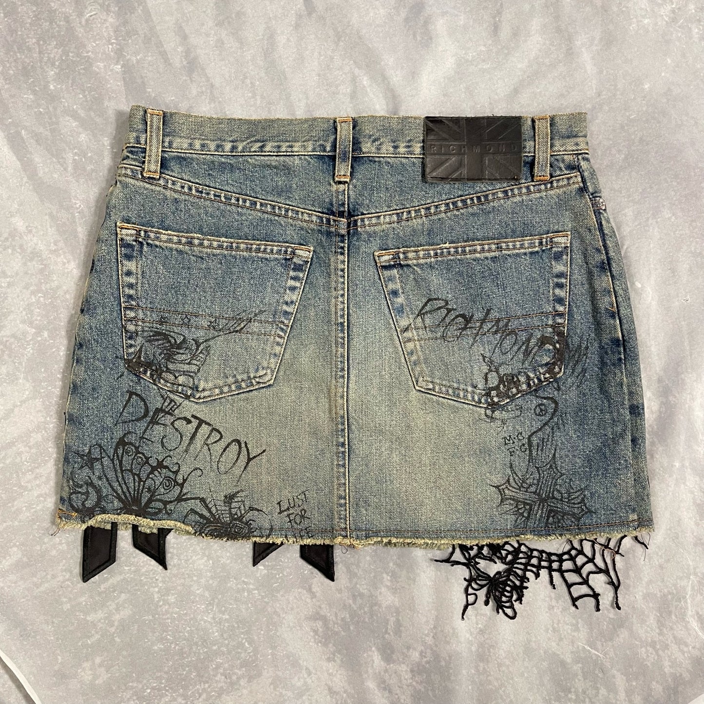 Richmond embellished mini denim skirt with script graphic (S)