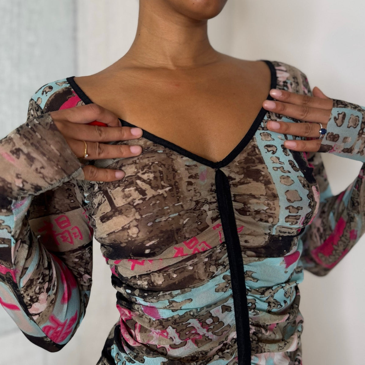 French vintage Y2K brown turquoise and pink graphic print sheer mesh long sleeve top with black trim