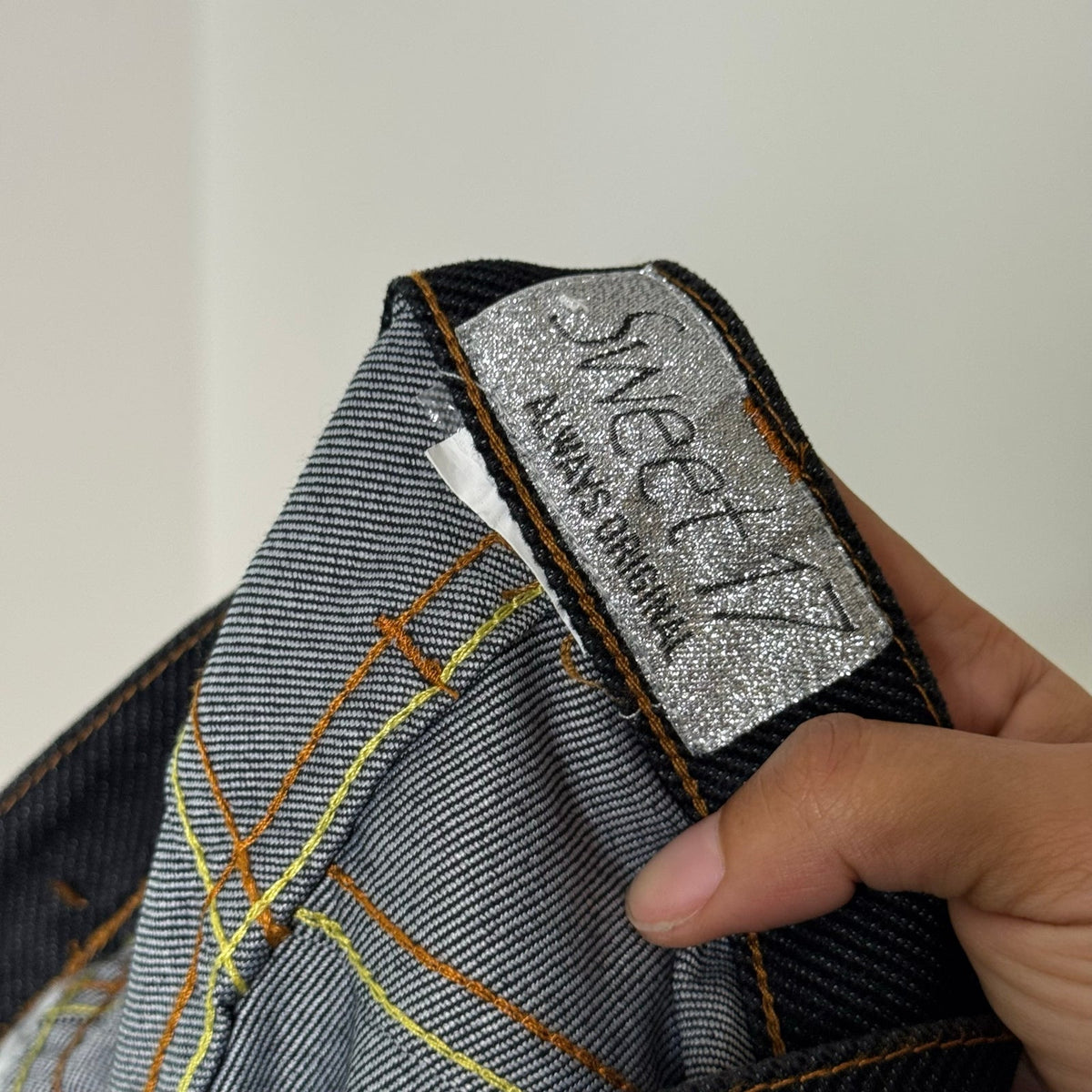 Euro vintage Y2K dark wash denim low-rise flare jeans with contrast stitching & wide bell bottom legs