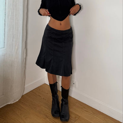 French vintage 2000s black denim knee-length skirt with flared panels & back zipper