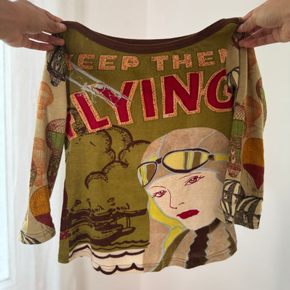 Euro vintage 00s olive green illustrated graphic top with lettering & retro aviator print