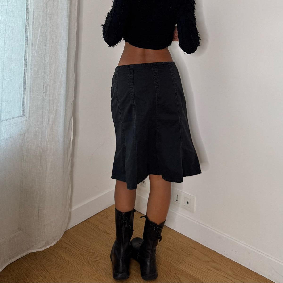 French vintage 2000s black denim knee-length skirt with flared panels & back zipper