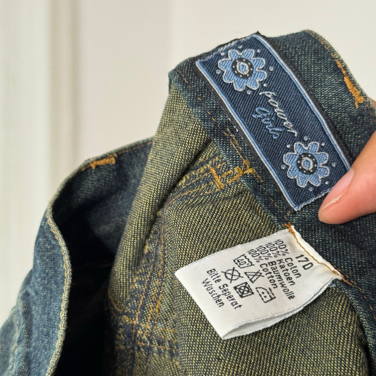 Euro vintage Y2K dark blue faded wash denim jeans with contrast stitching, flared legs & wide cuffs
