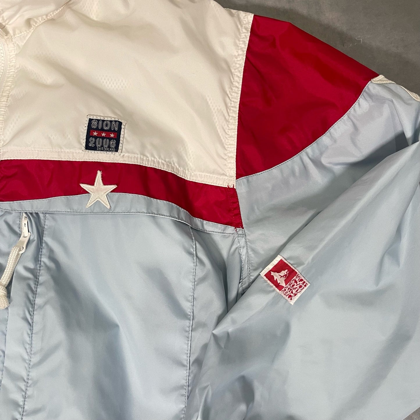 90s baby blue oversized sporty Swiss varsity windbreaker jacket (XS/S)