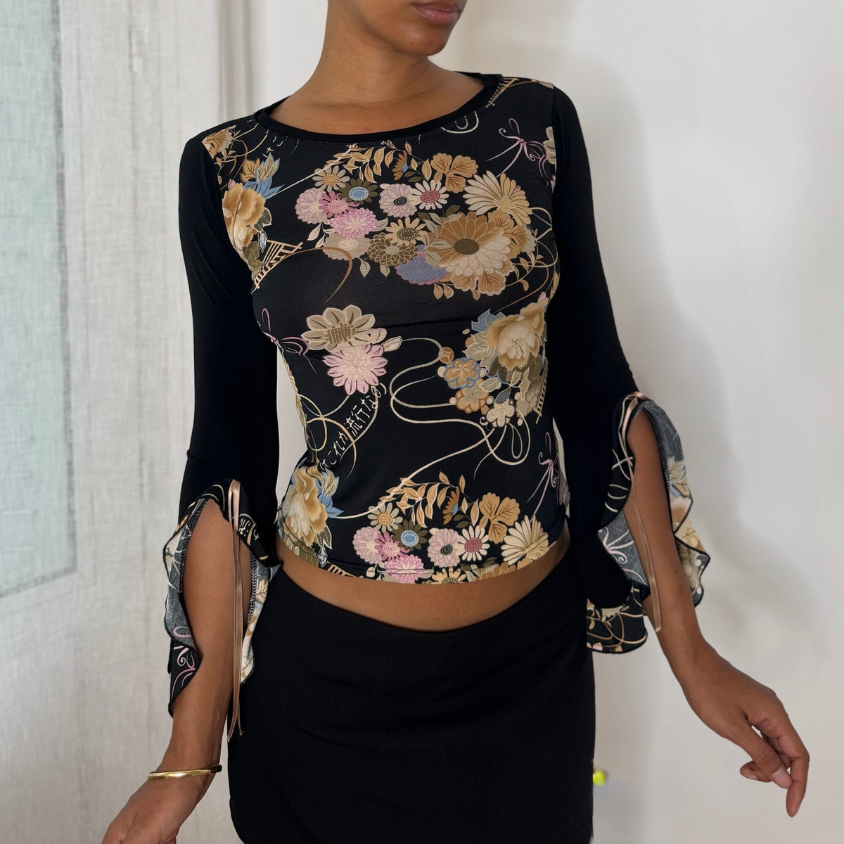 French vintage Y2K black floral print slinky long sleeve top with dramatic split bell sleeves