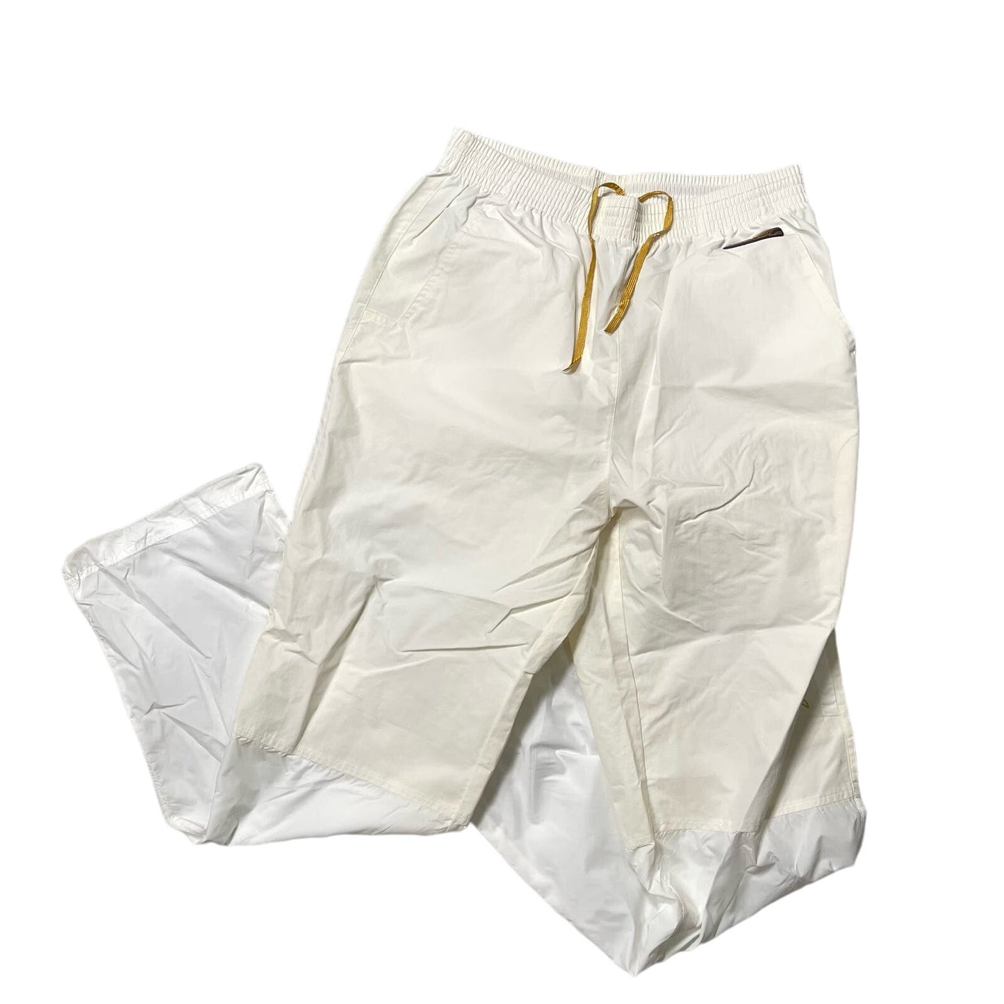 Vintage 00s Reebok white and creamy baggy nylon sweatpants (S-M) blokette