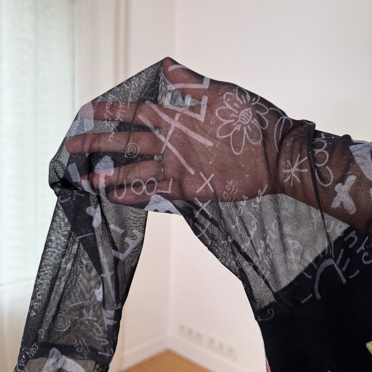 Misia Paris French vintage Y2K black illustrated graphic top with French poetry print & sheer doodle mesh sleeves