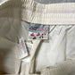 Vintage 00s Reebok white and creamy baggy nylon sweatpants (S-M) blokette